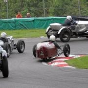 vscc cadwell park 723 duncan wood overtakes the slower cars in the haipin during the short handicap race for pre war cars